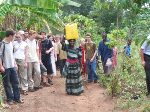 A lady from the village with a jerry-can of water from the new well